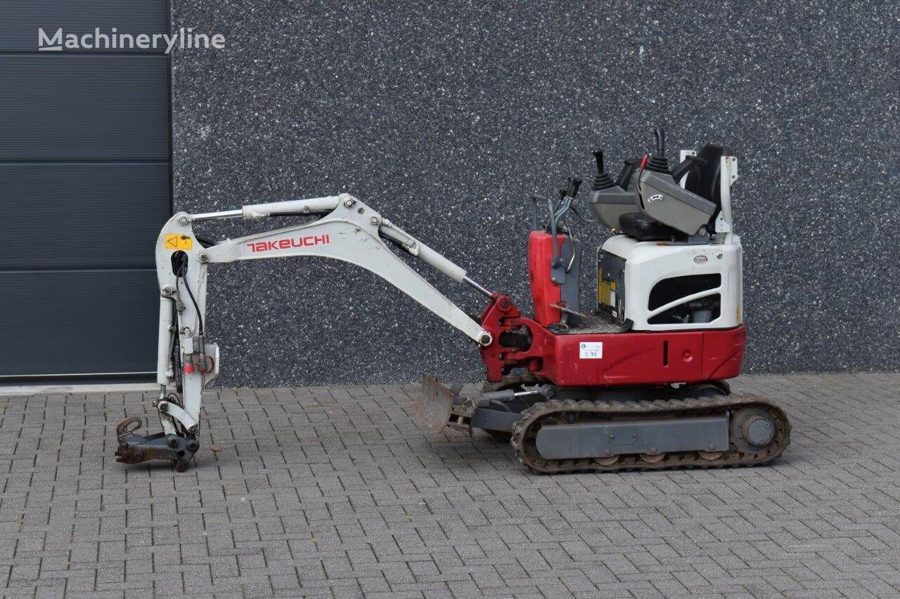pelle sur chenilles Takeuchi TB210R
