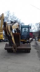 pelle sur pneus Caterpillar M313D